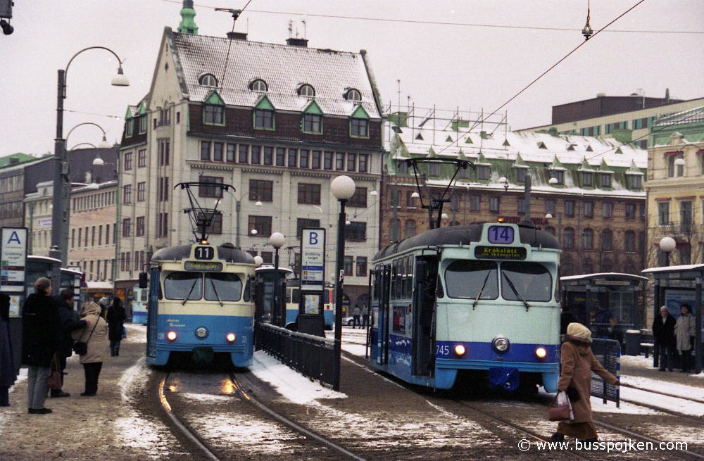 728 (with only the pantograph of 838 seen behind) -11, and 745-14 (now a discontinued line), 
January 2004.